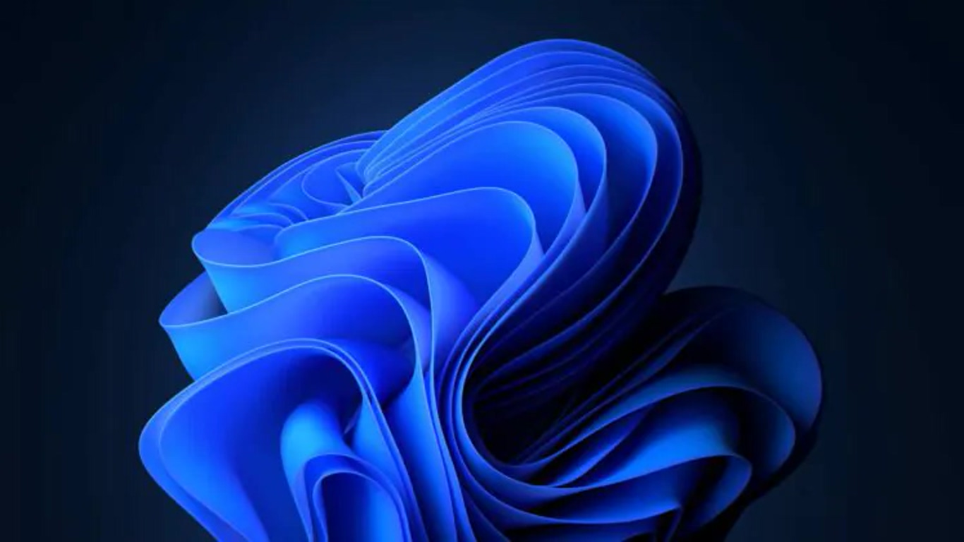 Blue abstract sculpture of curved ribbons on a dark background.
