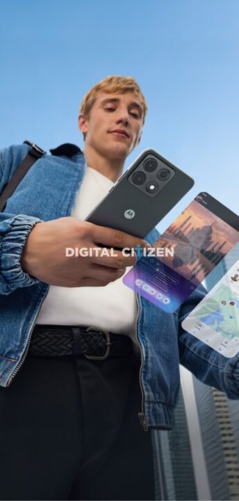 Young man in a denim jacket outdoors holds a smartphone with floating app screens, symbolizing a digital citizen against a city skyline backdrop.