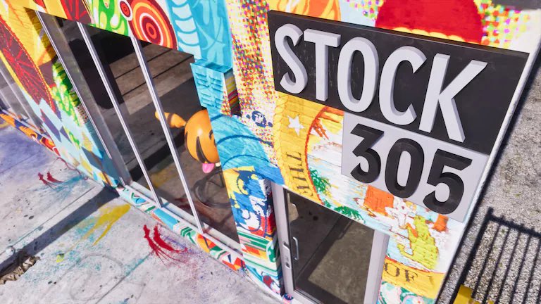 Vibrant Graffiti covered Storefront with Glass Doors and a Bold 'stock 305' Sign Above the Entrance