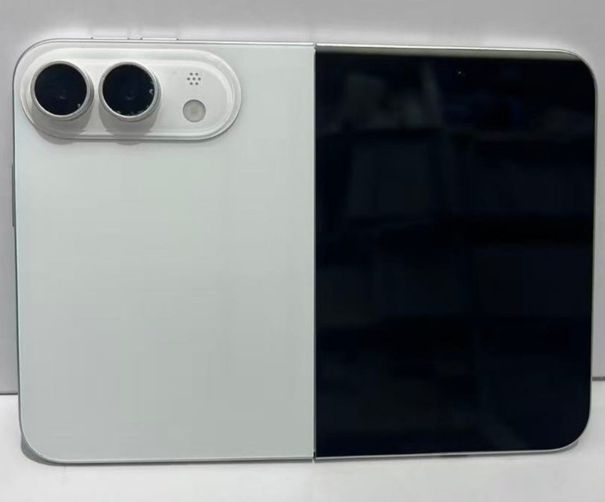 Foldable device with light gray left panel featuring two camera lenses beside a black display on the right edge.