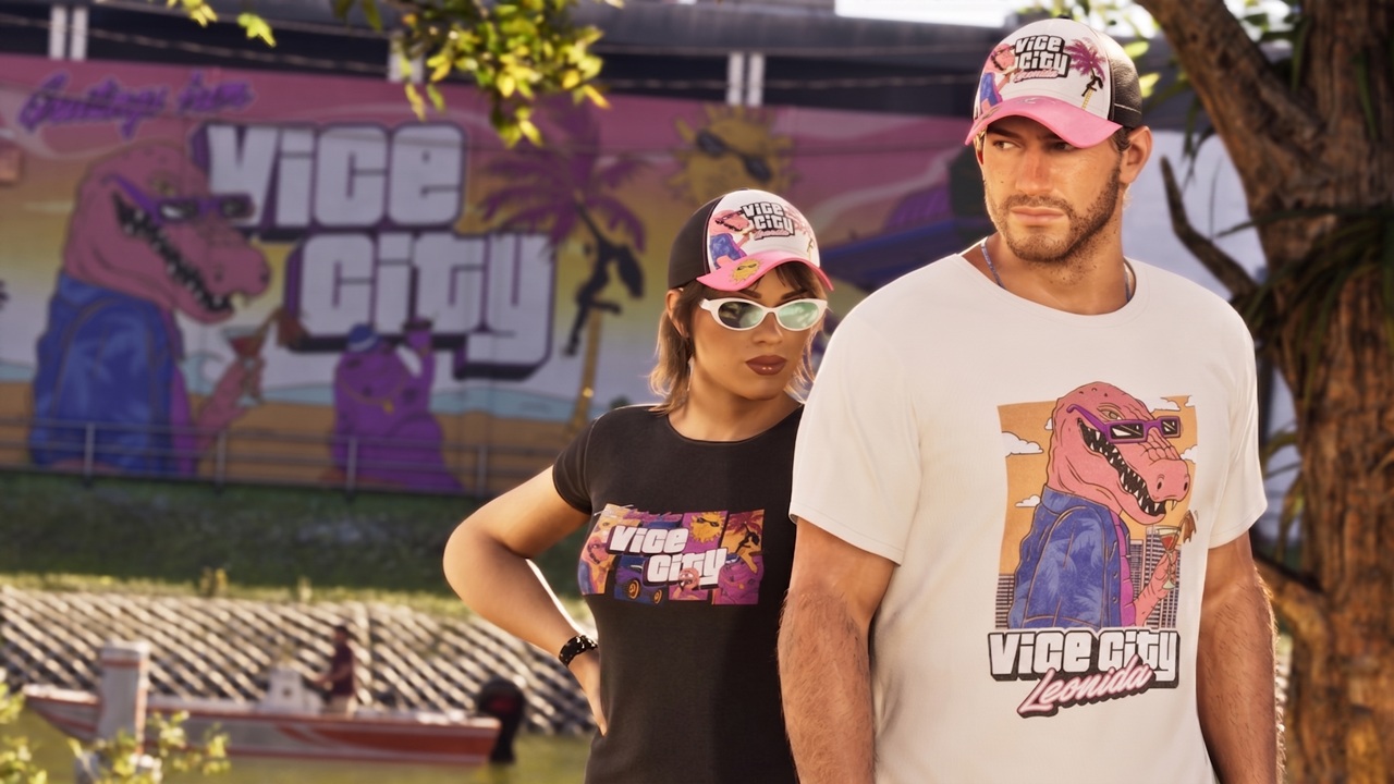 Man and Woman Wearing Vice City themed Clothing Standing in Front of a Colorful Mural Showing the 'vice City' Logo