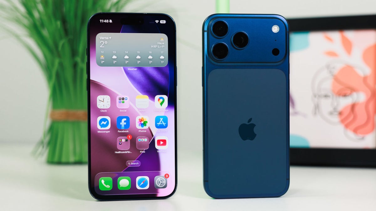 Front and back of blue iPhone pair on a desk: left shows home screen with app icons, right displays triple-camera array and Apple logo on blue back.