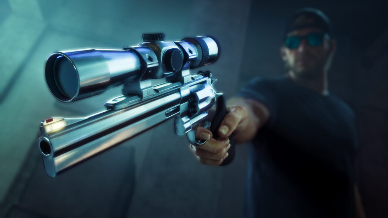 Close up of a Scoped Precision Rifle Aimed Forward a Blurred Person Wearing Sunglasses is in the Background