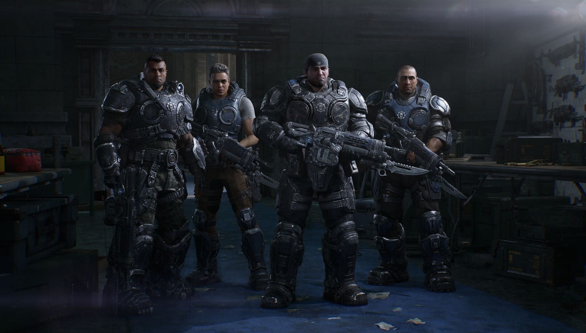 Four Heavily Armored Soldiers Stand Side by Side in a Dim Industrial Room Rifles at the Ready