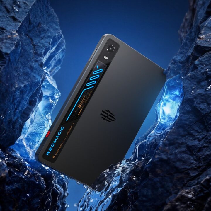 Black RedMagic gaming smartphone angled in icy blue environment, showcasing its side cooling vent with blue LED accents.
