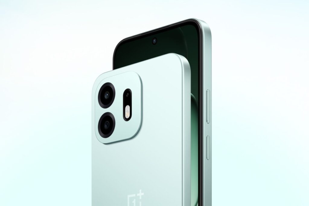 Close-up of a mint-green smartphone back with a square triple-camera module and flash on the left edge edge of the module.