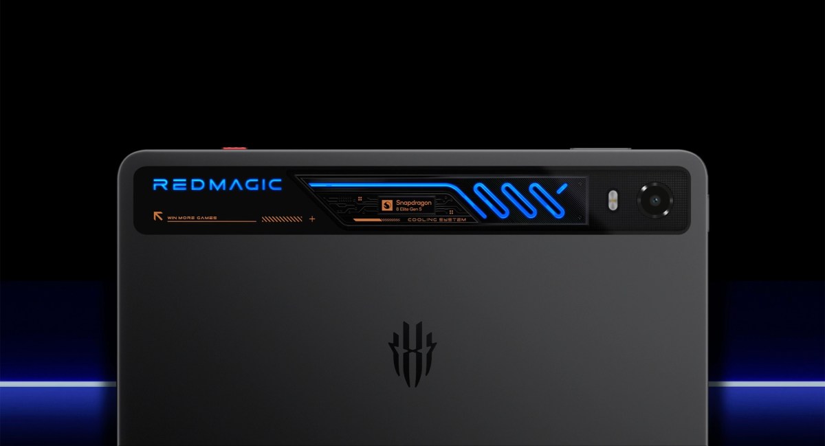 Back of a black RedMagic gaming laptop with blue neon cooling vents and camera on the right side