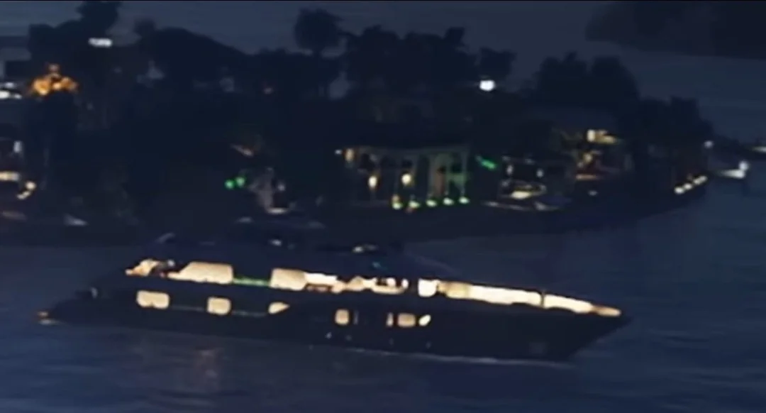 Is this vercetti estate 1 Nighttime Scene of a Lit Passenger Boat Sailing on Dark Water Near a Shore with Illuminated Buildings and Trees in the Background oops the Previous Contains a Stray Character Corrected