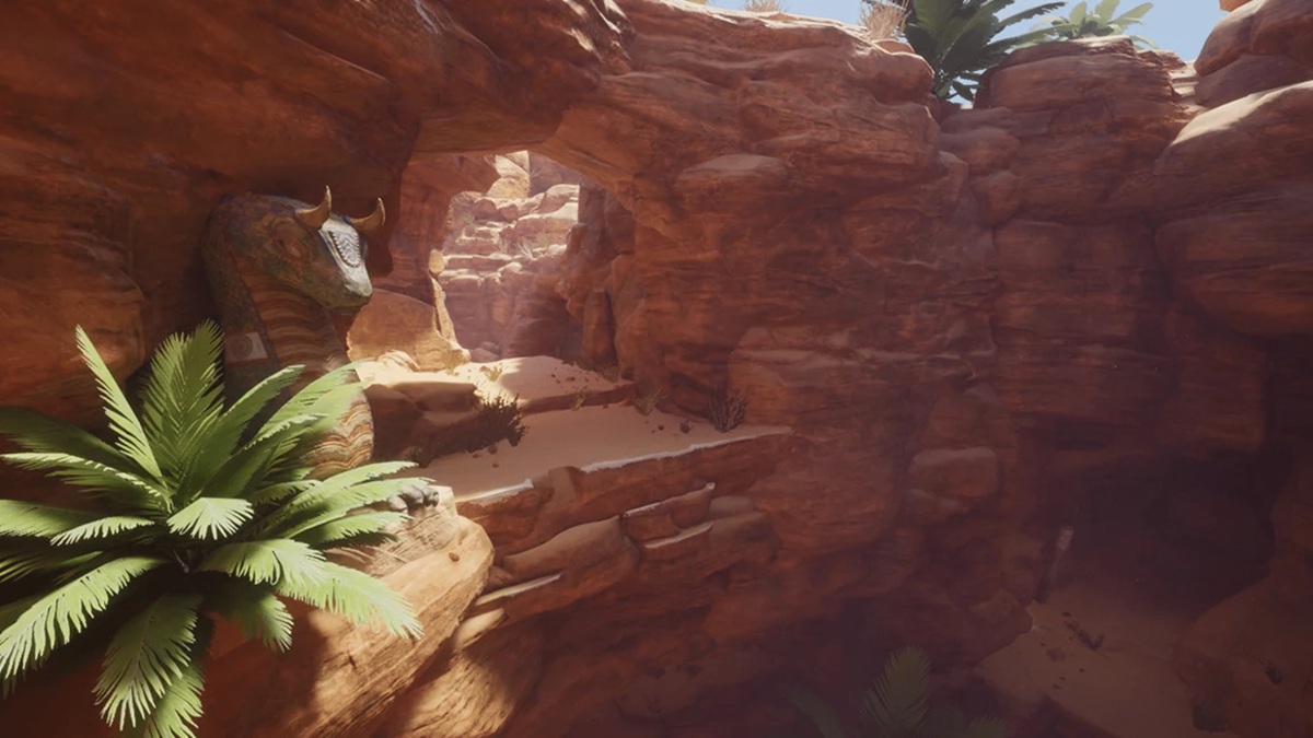 Desert Canyon with Red Sandstone Walls and a Carved Cobra Statue Peeking from Behind Rocks Palm Fronds in the Foreground