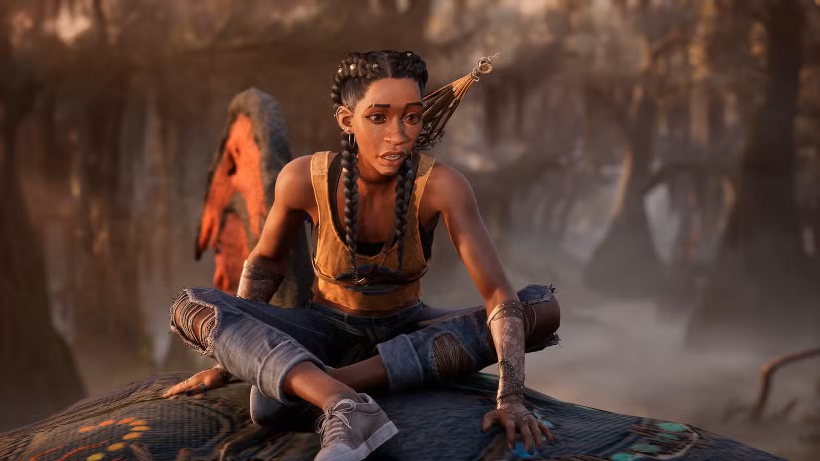 Young Woman with Braids Sits Crosslegged on a Patterned Board in a Misty Forest Wearing an Orange Tank Top and Ripped Jeans