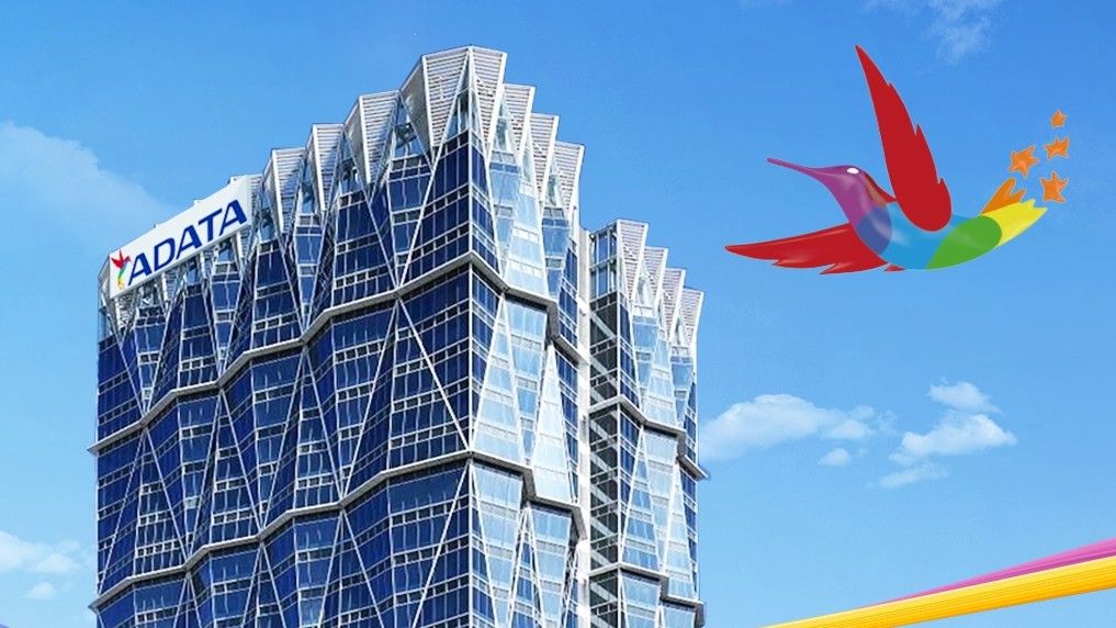 Glass High rise Building with Adata Sign and a Colorful Hummingbird in the Blue Sky