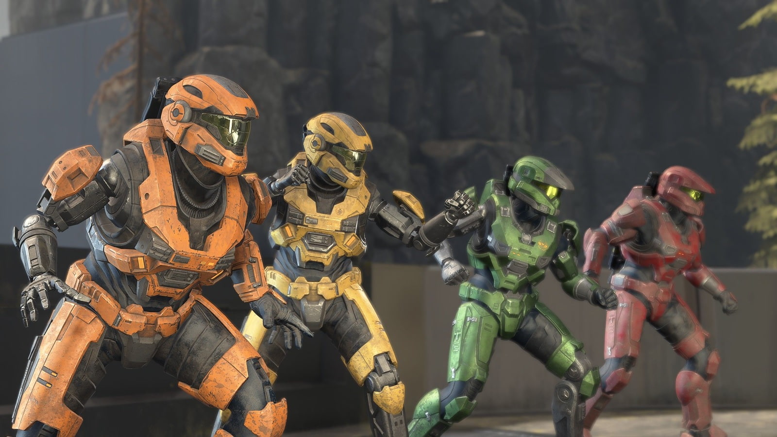 Four Armored Soldiers in Orange Yellow Green and Red Suits Run Forward Together in a Battle ready Line on a Urban Battlefield Scene