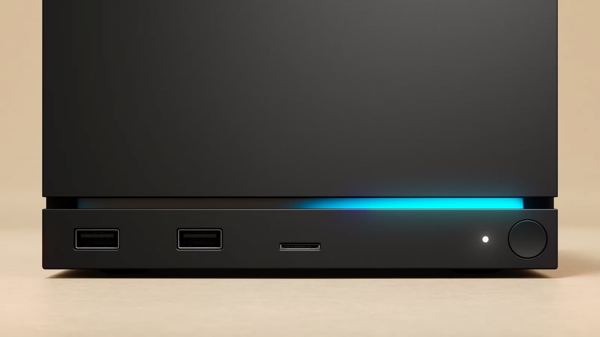 Front Panel of a Black Desktop Computer Tower with Two Usb Ports a Slim Card Slot a Glowing Blue Led Bar and a Round Power Button