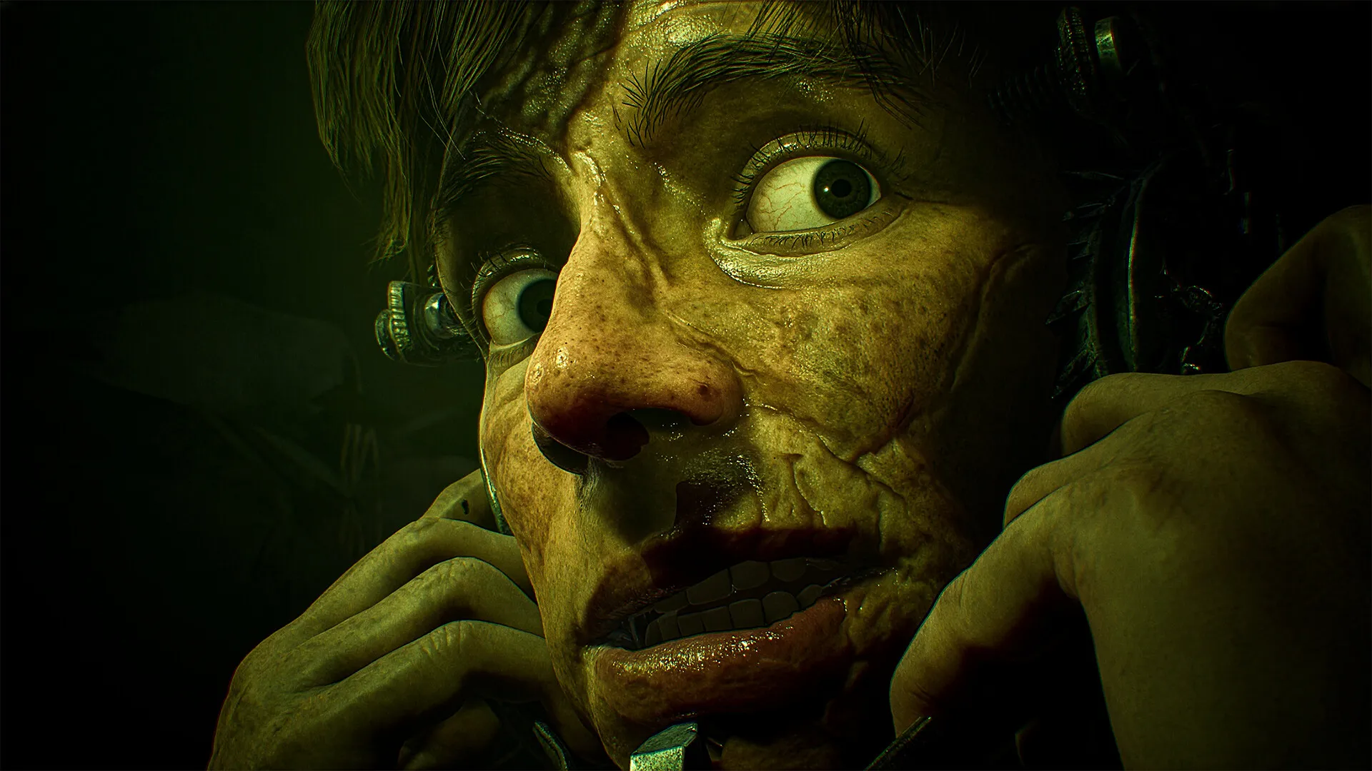 Close up of a Zombie like Face with Greenish Lighting Bulging Eye and Decayed Skin Being Pulled by Hands Nearby